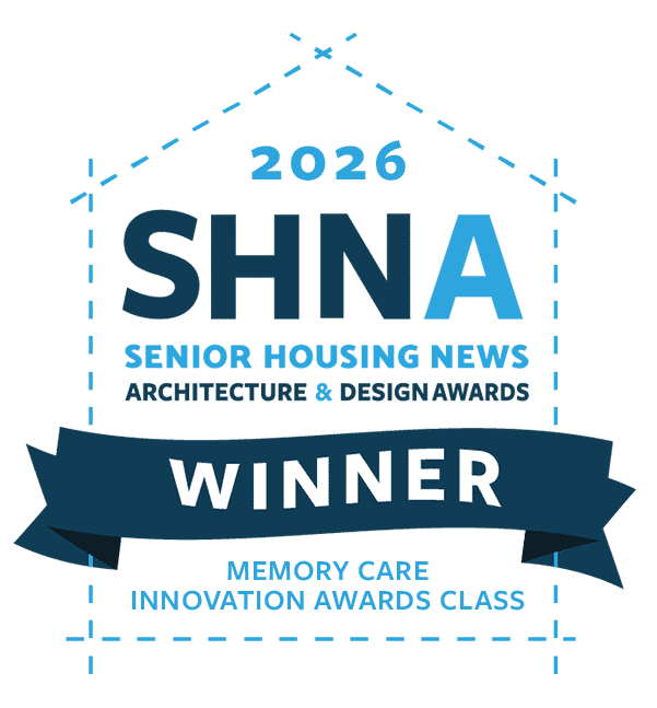 Badge reading 2026 SHNA Senior Housing News Architecture & Design Awards WINNER Memory Care Innovation Awards Class inside a blue house outline.
