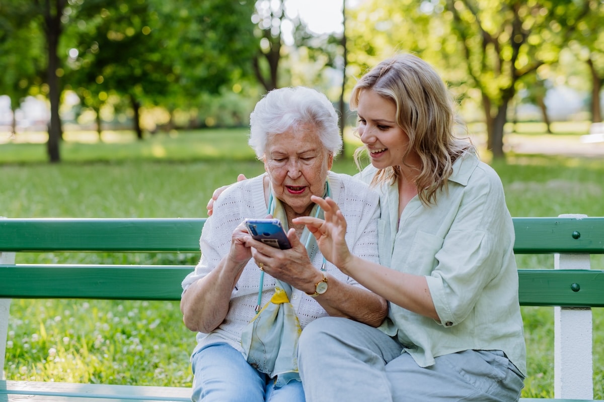 The Cordwainer | Senior getting help with her phone